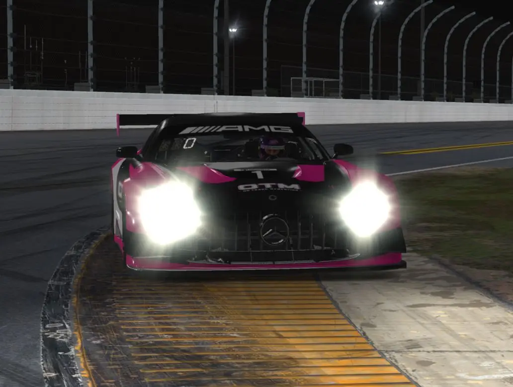 a race car with its headlights on