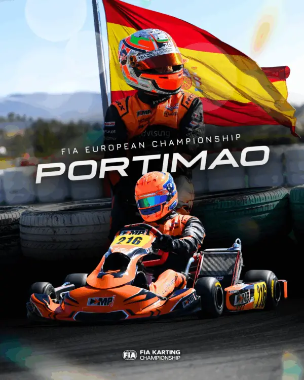 two people in helmets on a race track