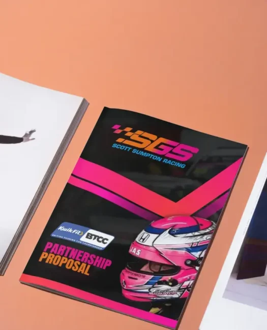 a group of magazines on a table