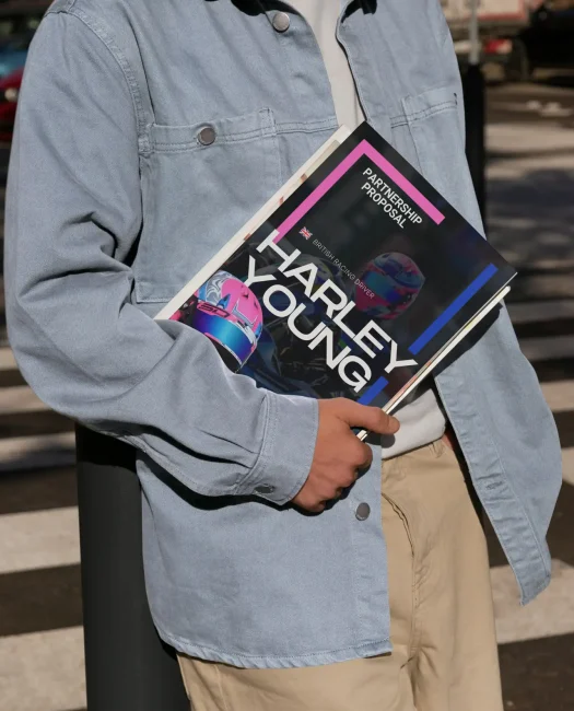 a person holding a magazine